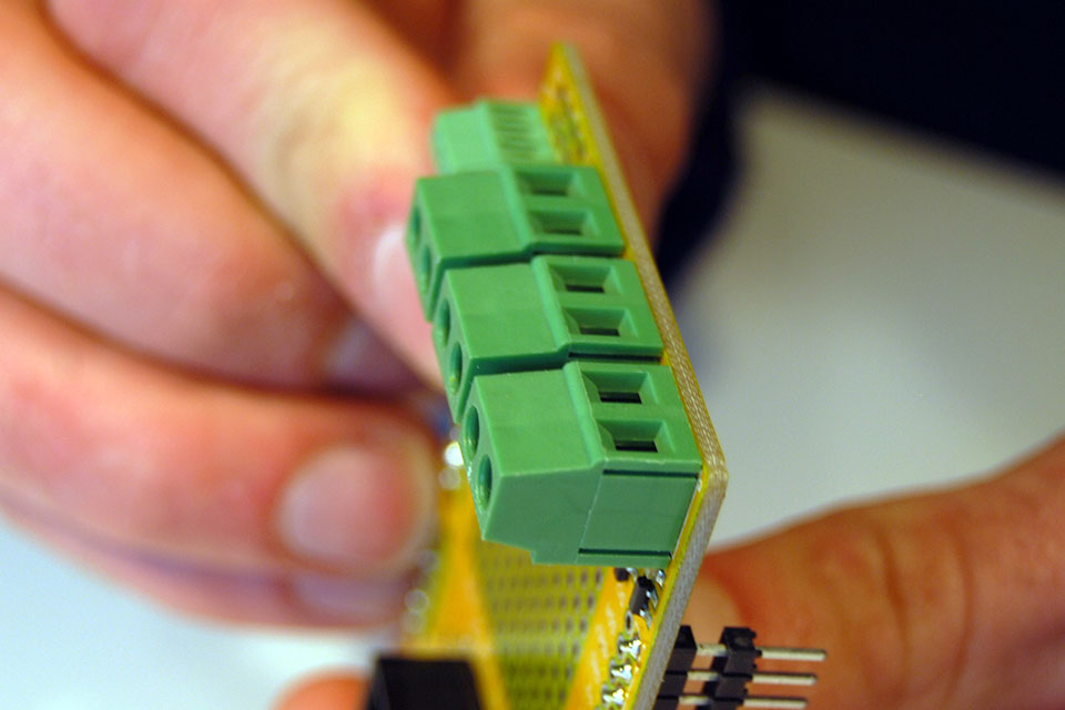 With one pin soldered, check the alignment and make adjustments where necessary.