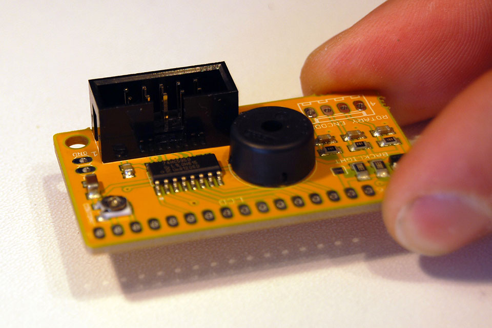 Next is the IDC box header. Take note of the marking on the board for the orientation. The open bit points towards the shift register.