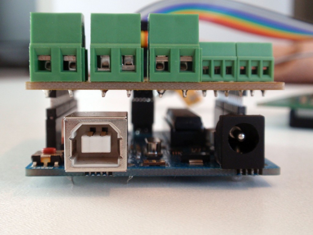 The elevated headers prevent problems with the high USB connector on the Arduino Uno