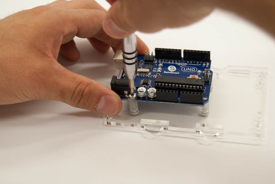 Get your Arduino and mount it on top of the spacers, using the other three M3x8mm bolts and 3 spacers.